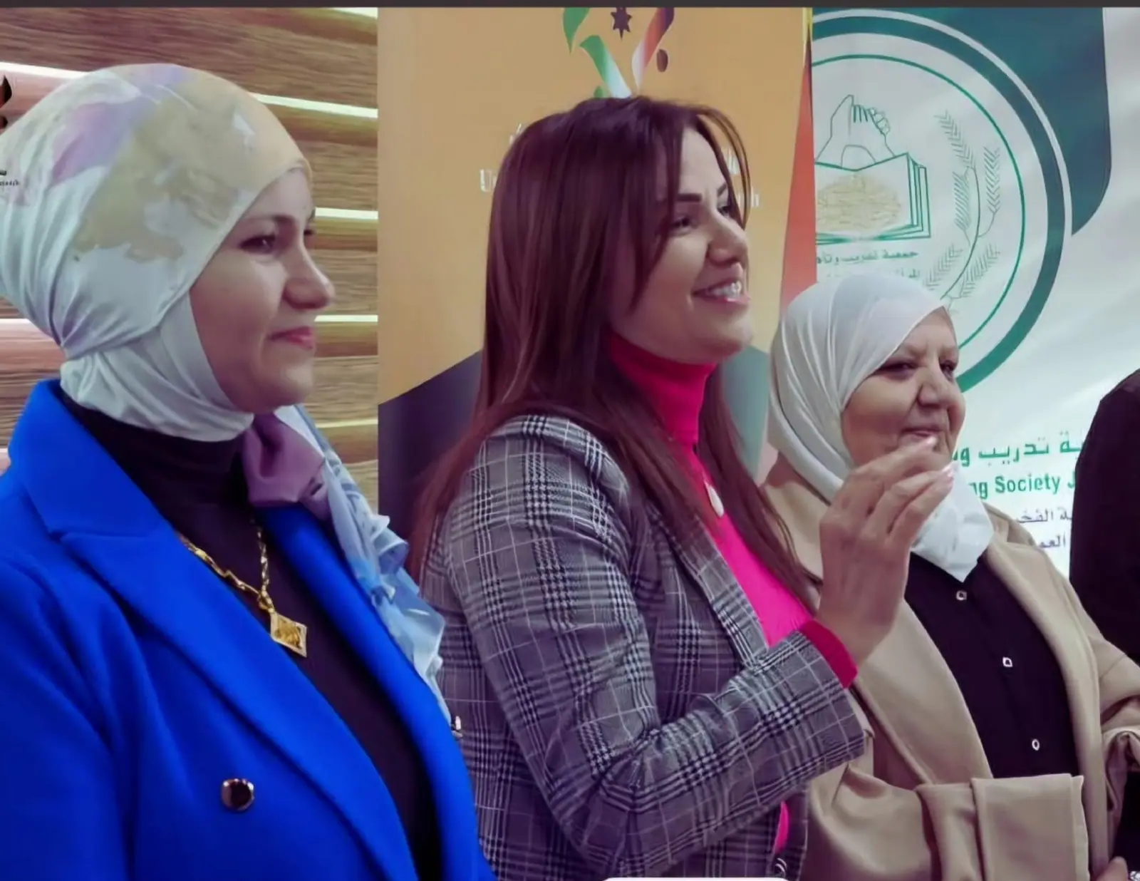 Manal Haddad engaging with women participants at a training workshop
